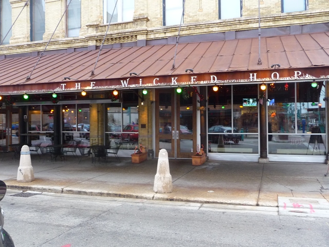outdoor-infrared-heater-below-steel-awning-over-sidewalk-cafe